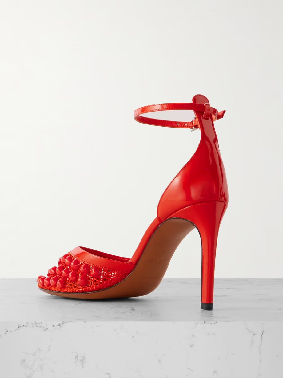 90 embellished fishnet and patent-leather pumps