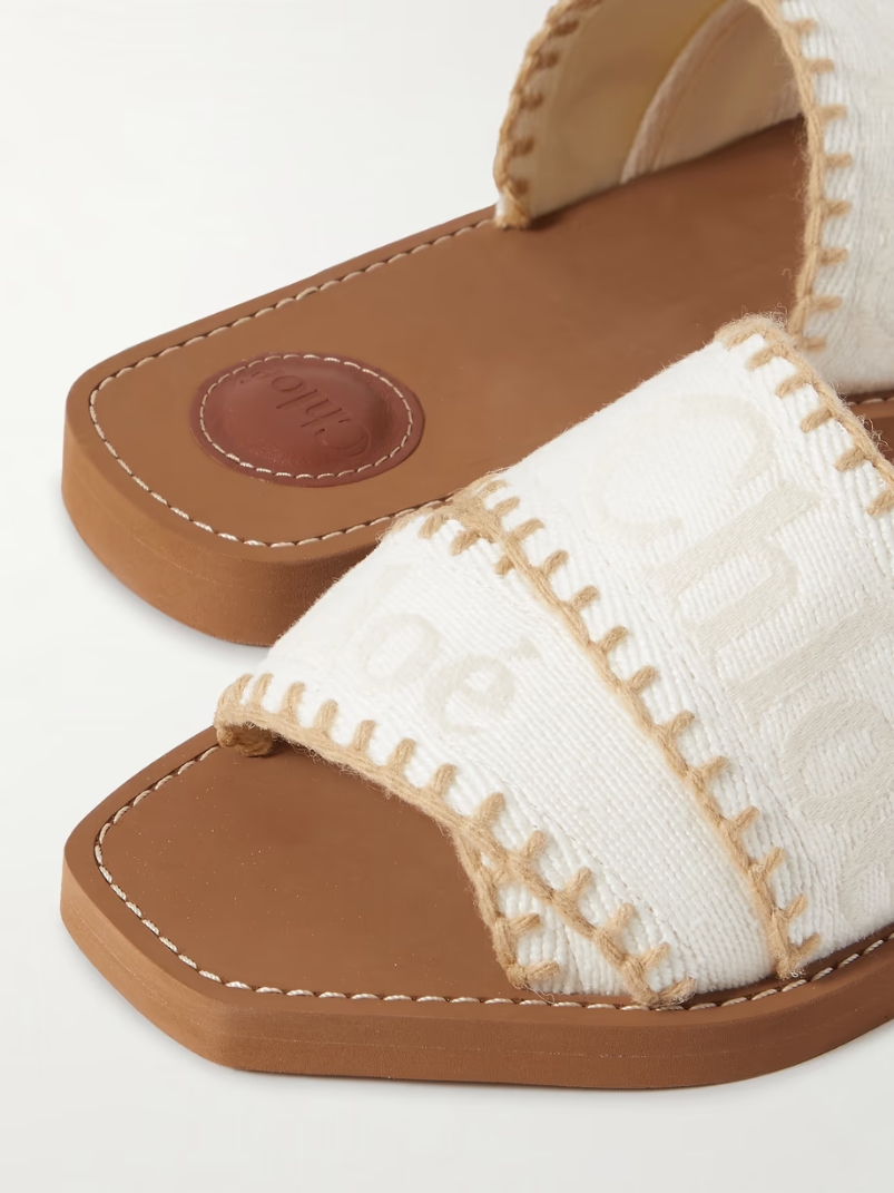 Woody whipstitched logo-jacquard canvas slides